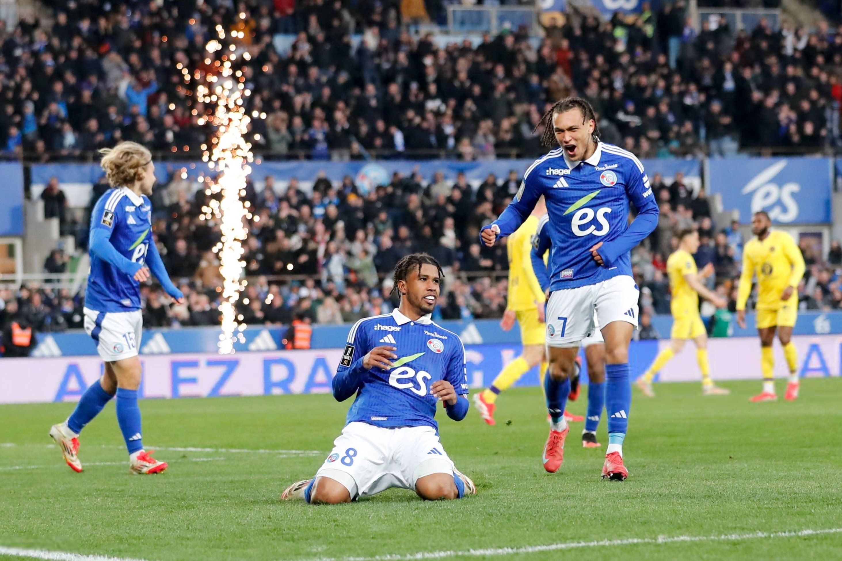 Andrey Santos knee slides after scoring a superb goal for Strasbourg against Toulouse.