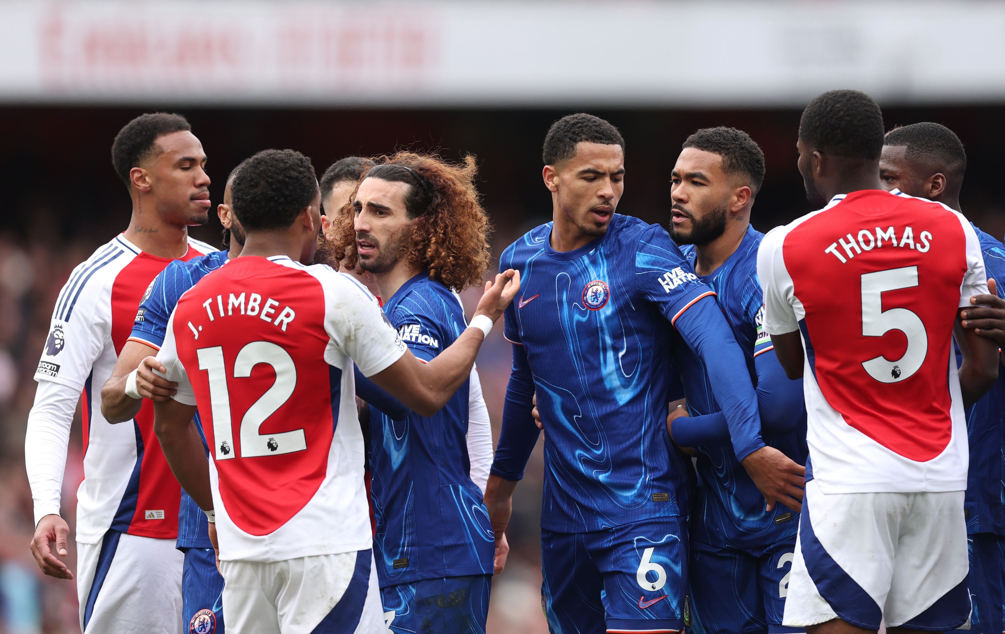 Chelsea and Arsenal players clash at the Emirates.