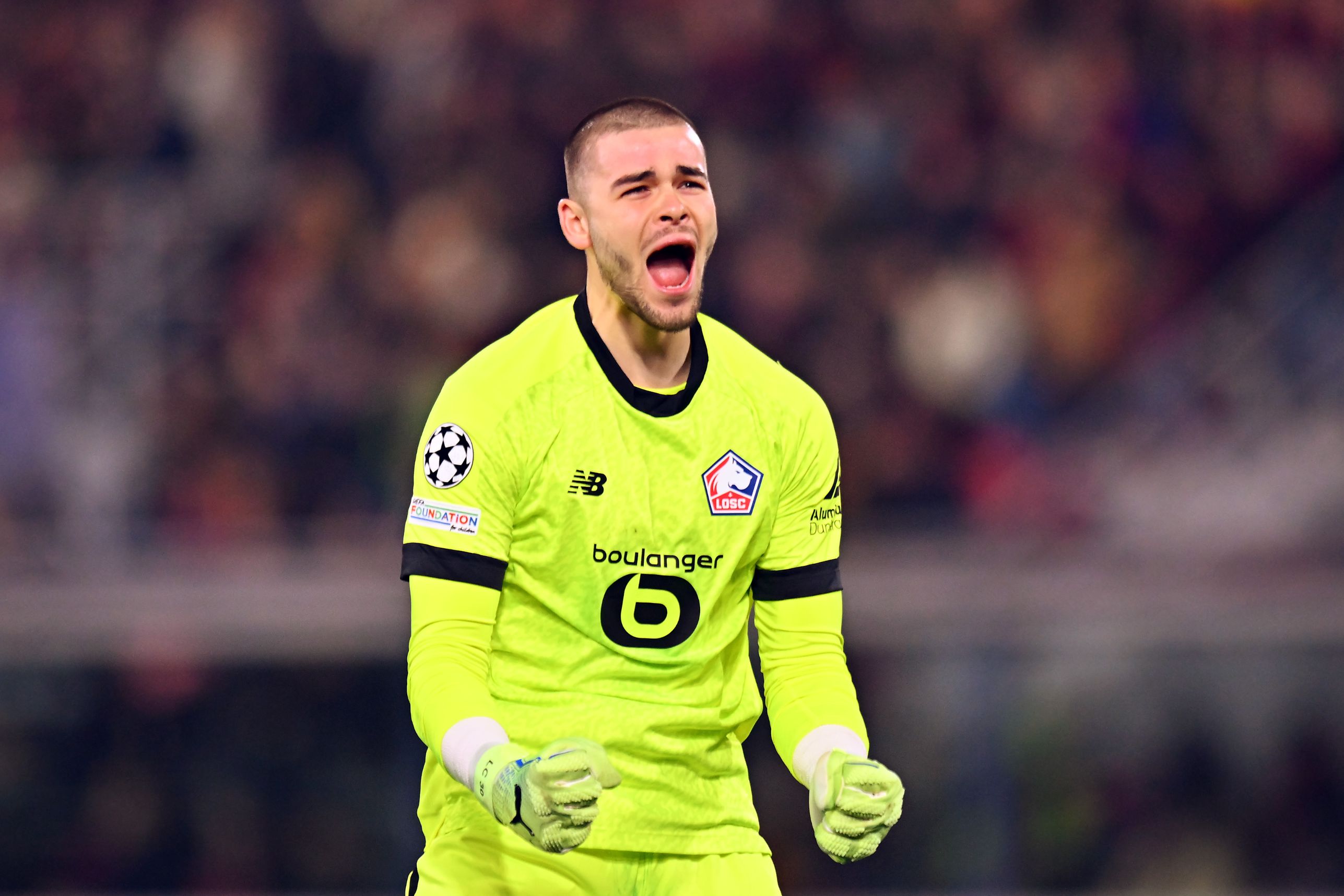 Lucas Chevalier celebrates a Lille goal.