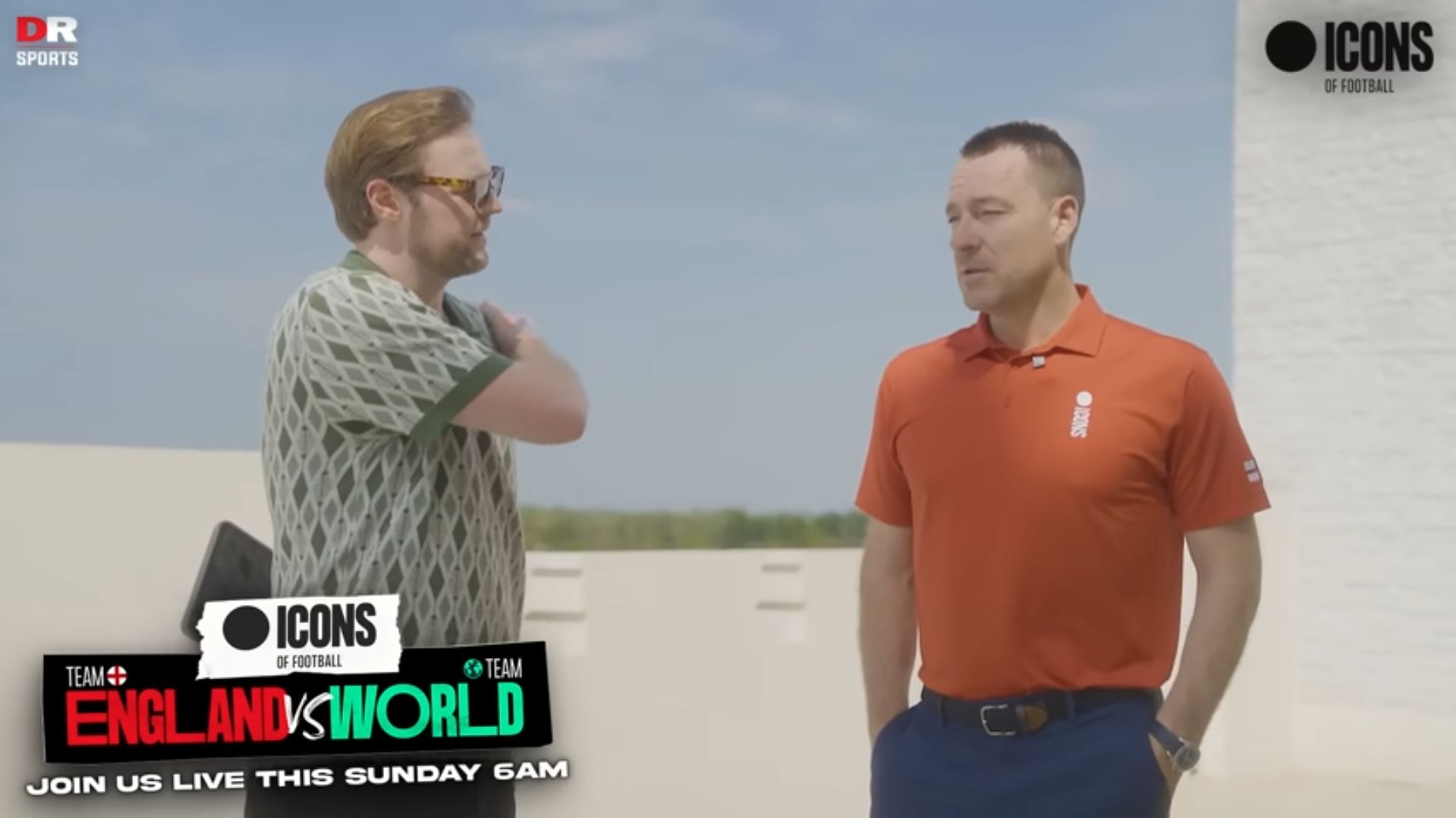 John Terry chats on a golf course.