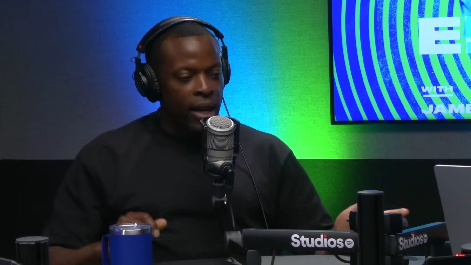 Nedum Onuoha speaks on a podcast.