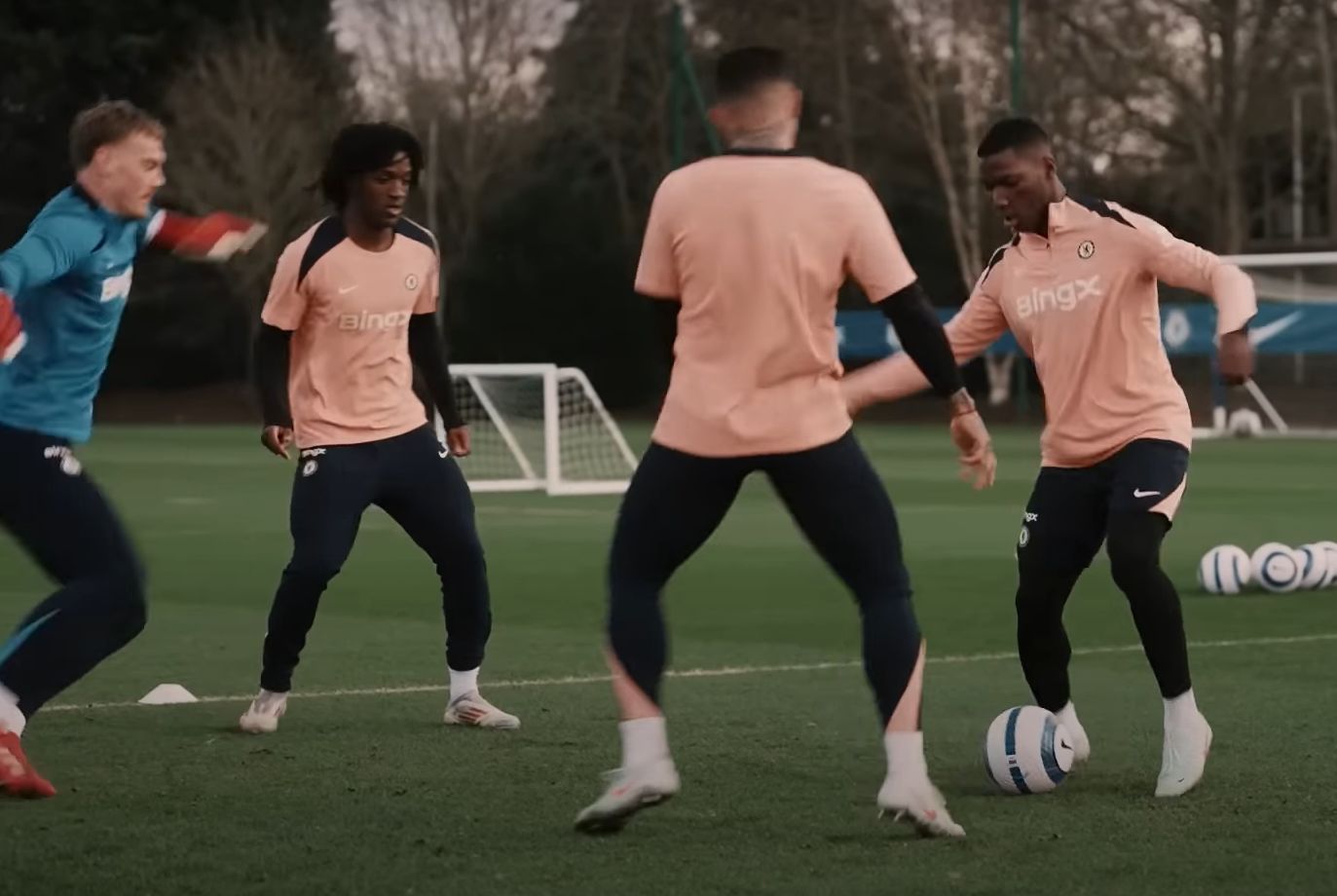 Shim Mheuka trains in a rondo in first team training at Cobham.