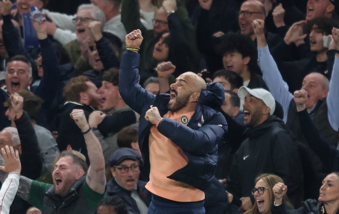 Enzo Maresca celebrates in a peach jumper.
