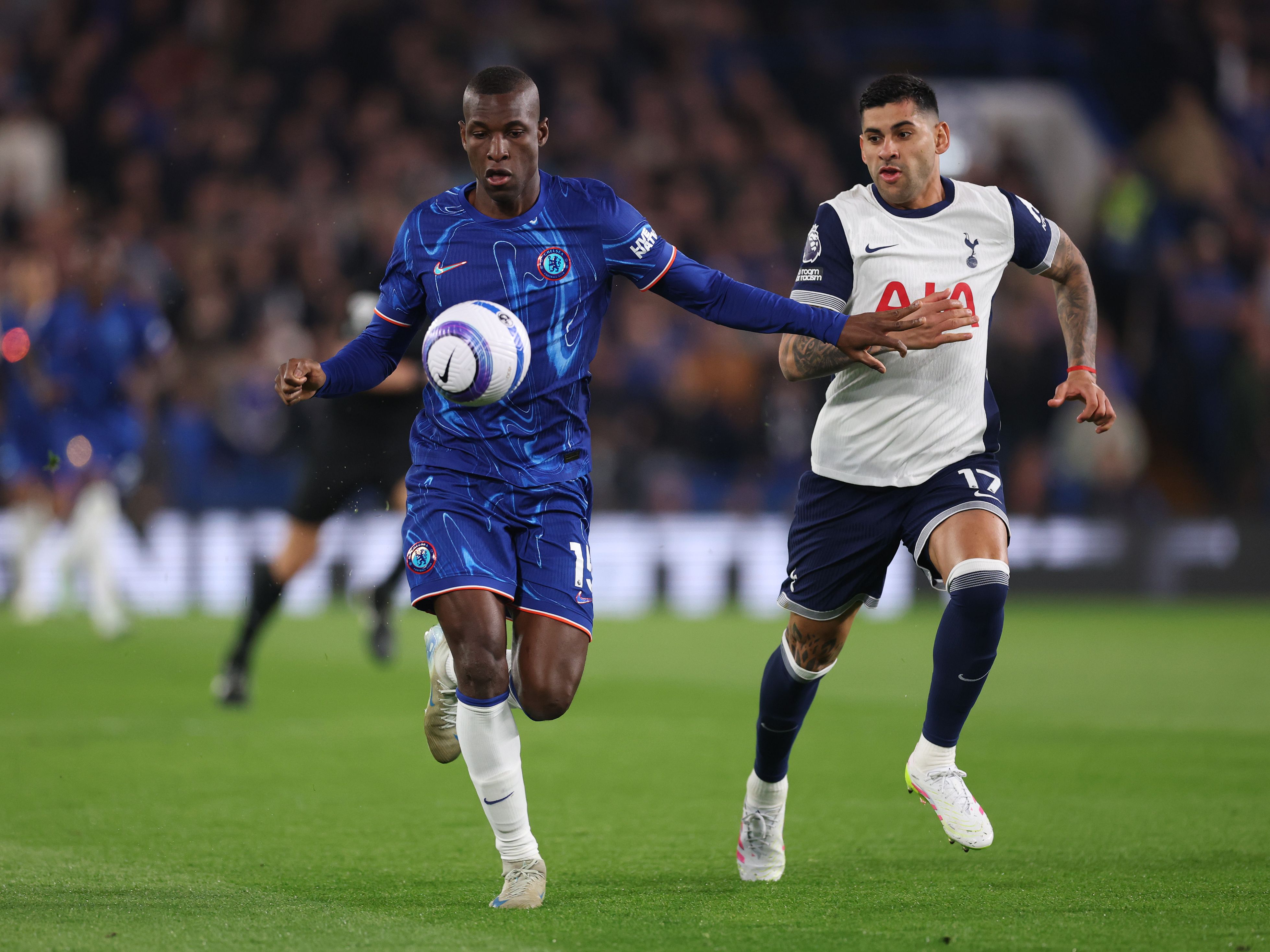 Nicolas Jackson battle for possession against Tottenham.