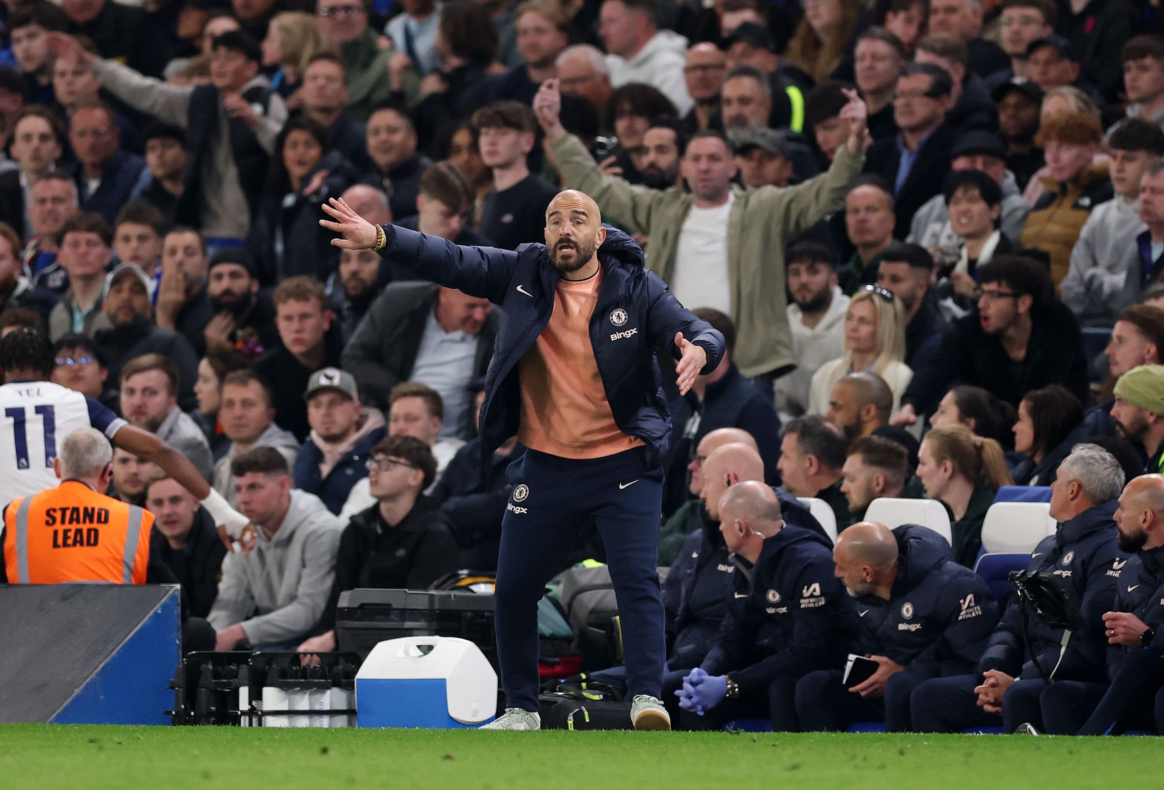 Enzo Maresca is active on the touchline.