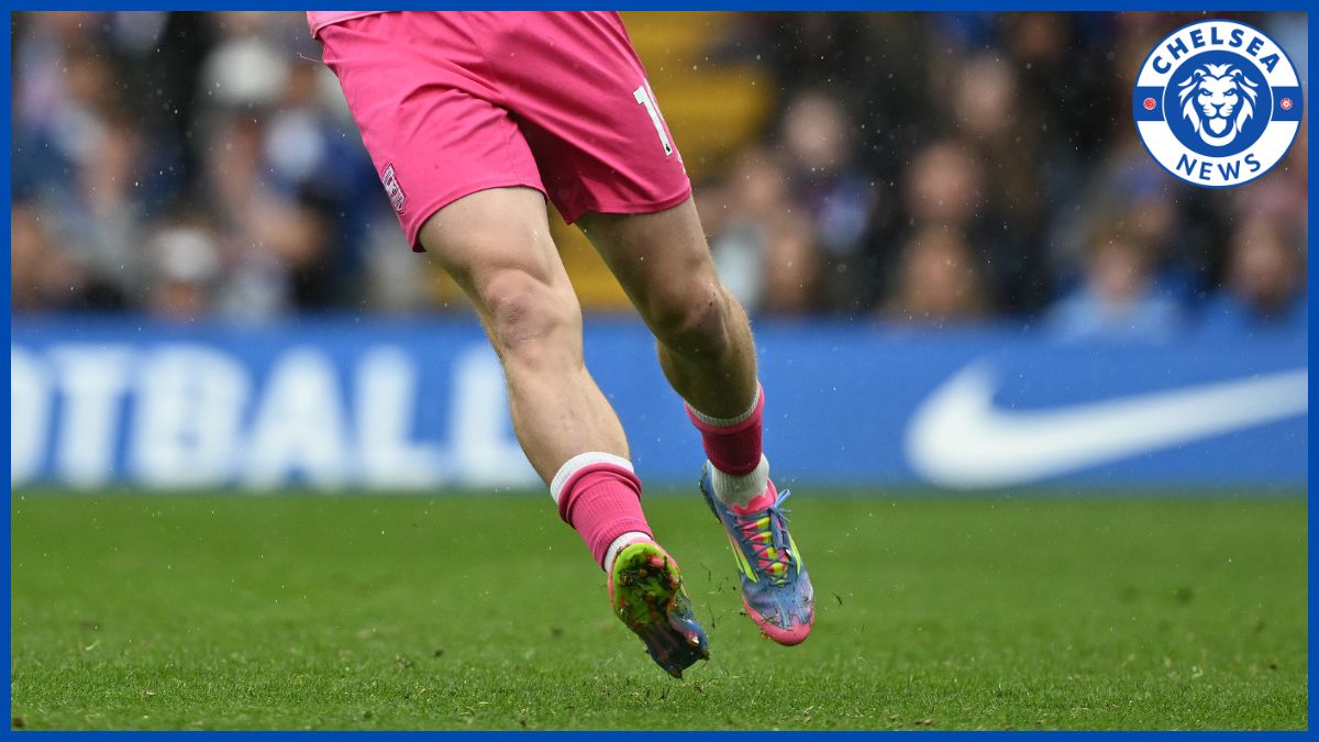 Liam Delap's legs with a Chelsea logo.