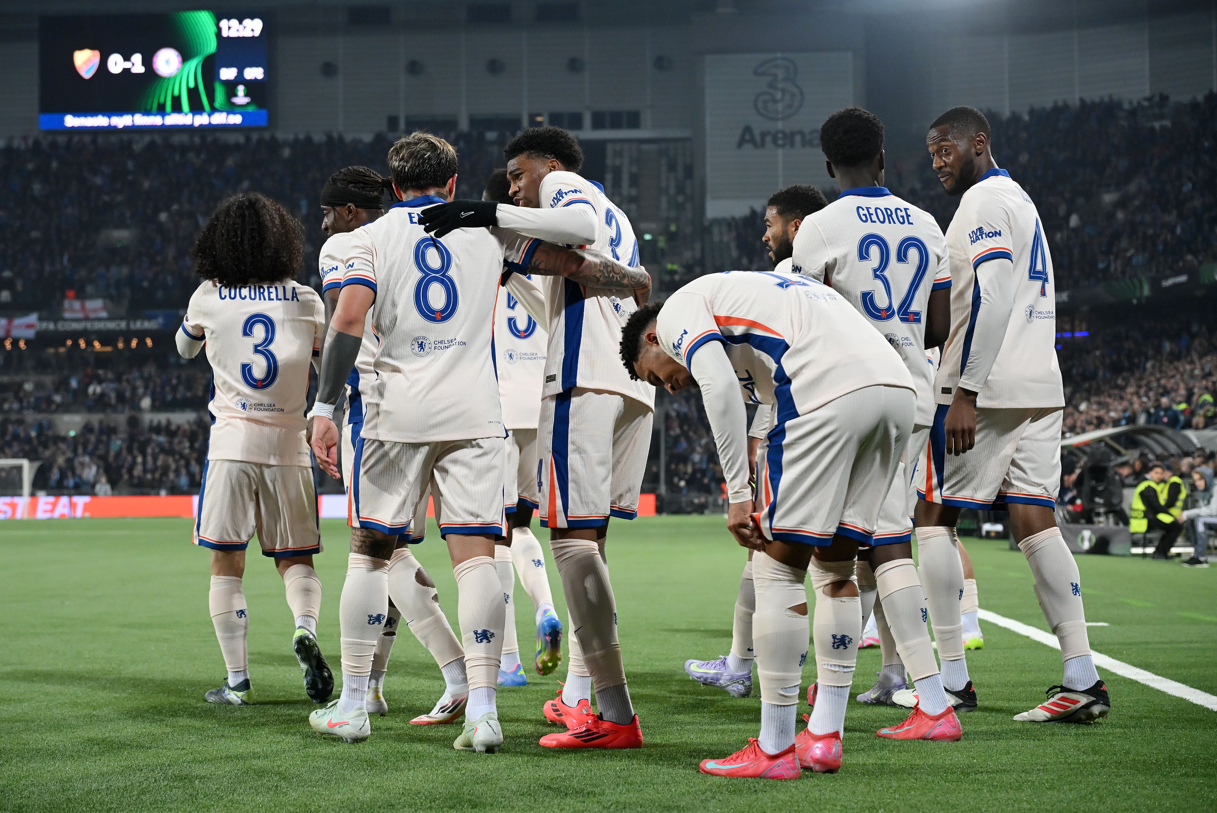 Chelsea players celebrate goal against Djurgarden.