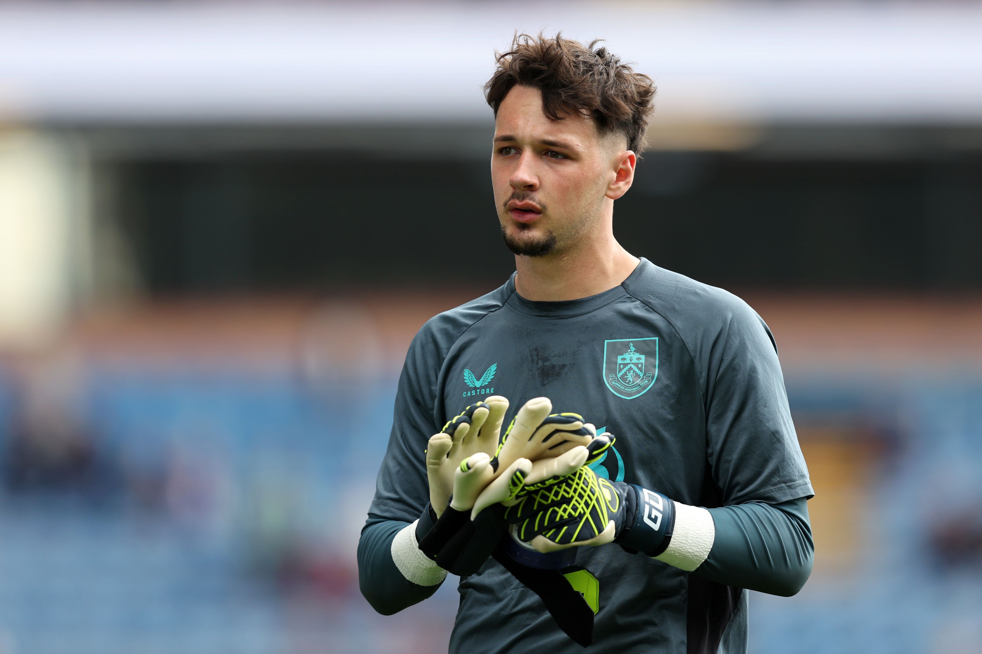 James Trafford warms up for Burnley.