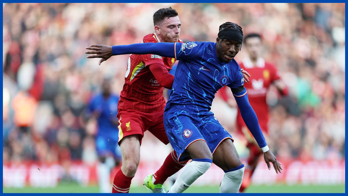 Noni Madueke fights off Andy Robertson.