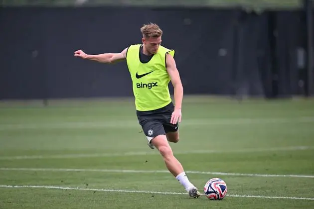 Liam Delap strikes a ball in training.