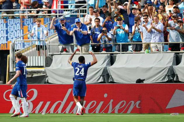 Reece James celebrates scoring against Benfica.