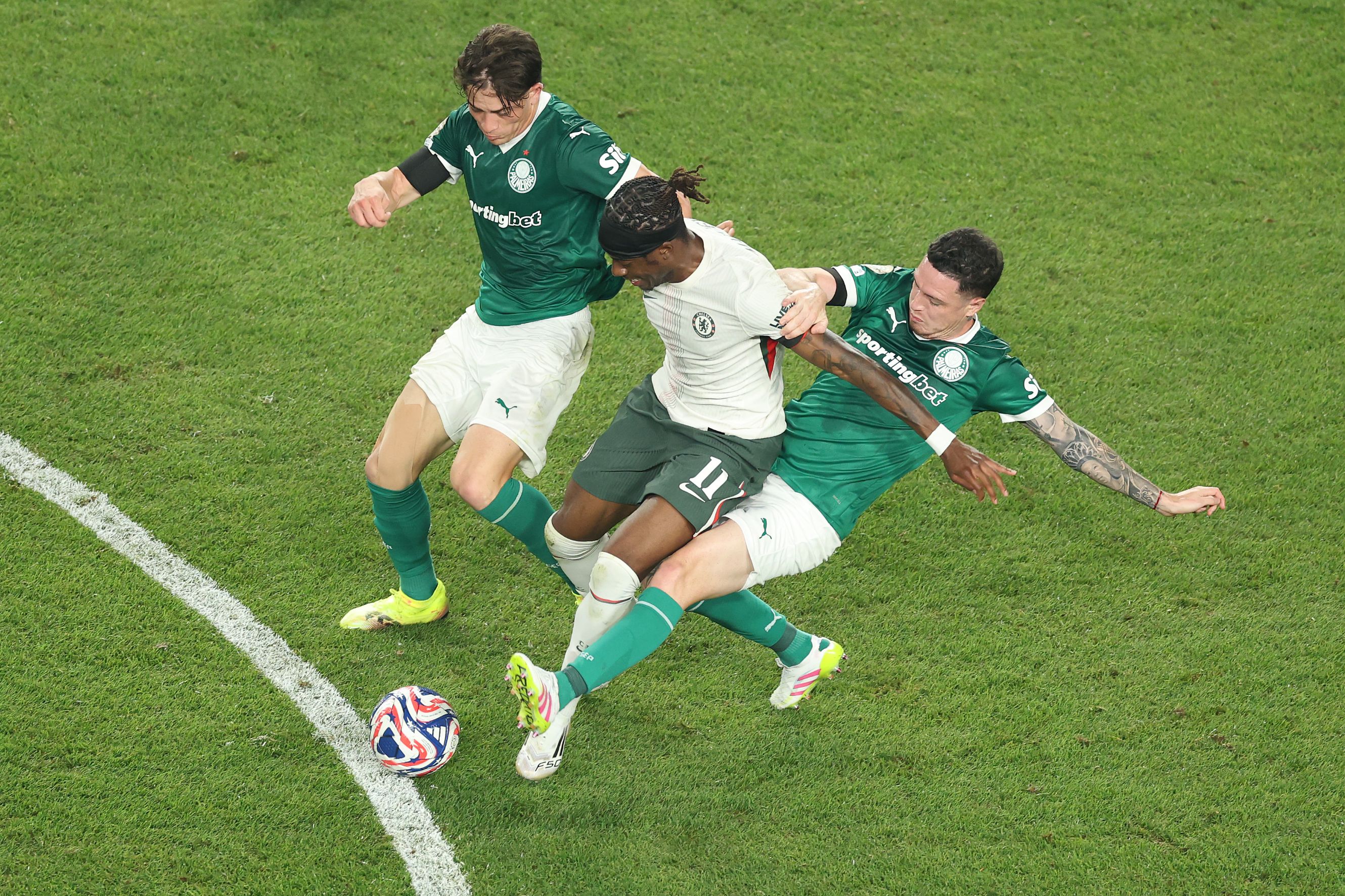 Noni Madueke battles for possession against Palmeiras.