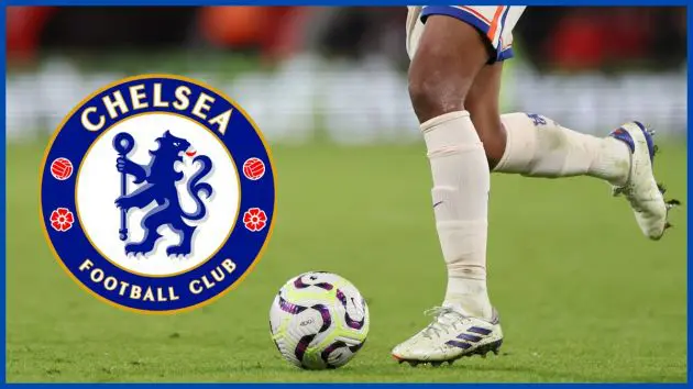 Renato Veiga runs with a Chelsea logo.