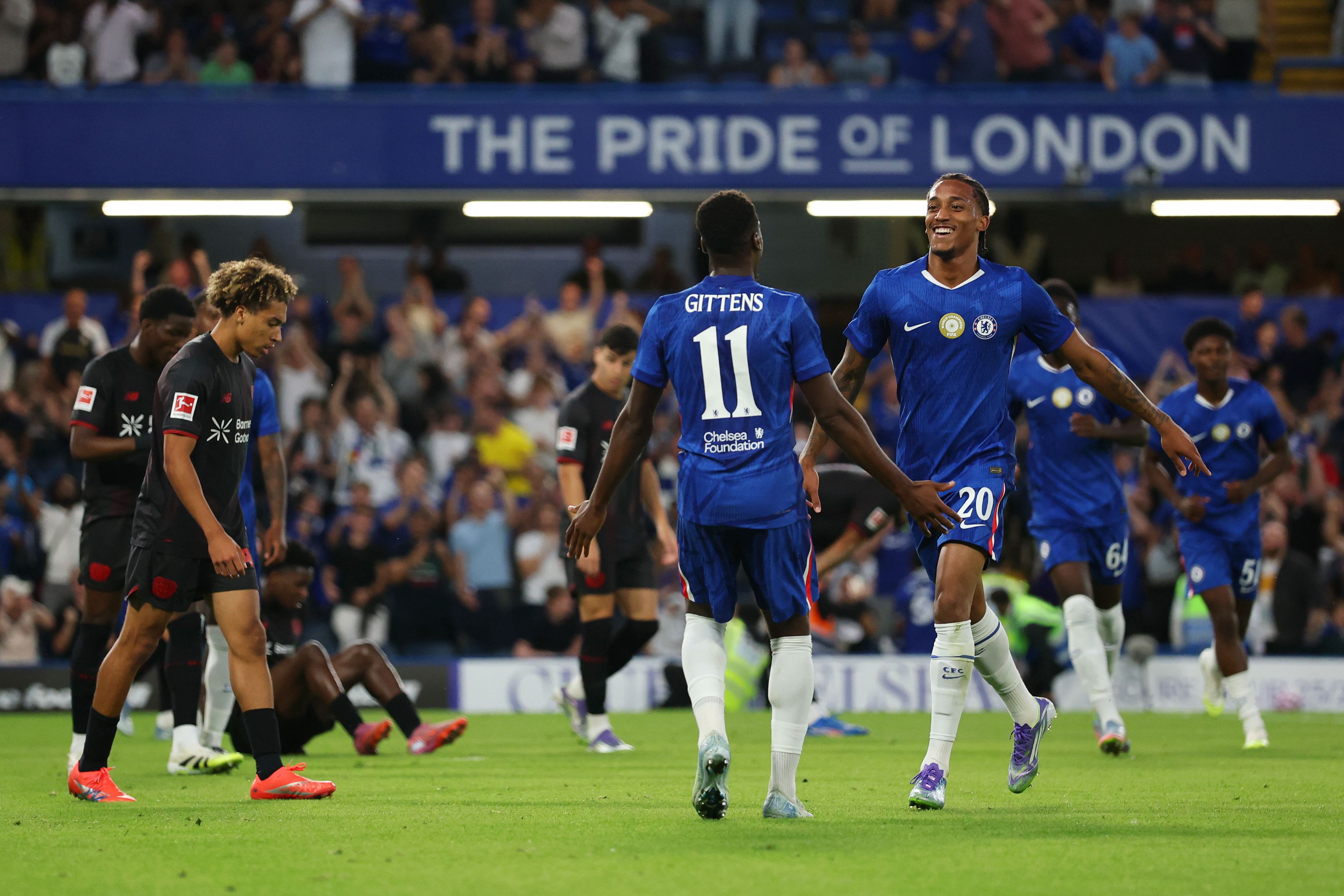 Jamie Gittens celebrates with Joao Pedro.