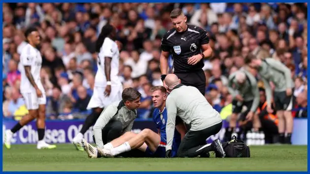Liam Delap lies injured.