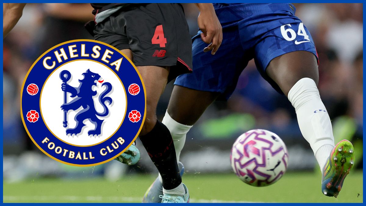 Genesis Antwi fights for the ball with a Chelsea logo.