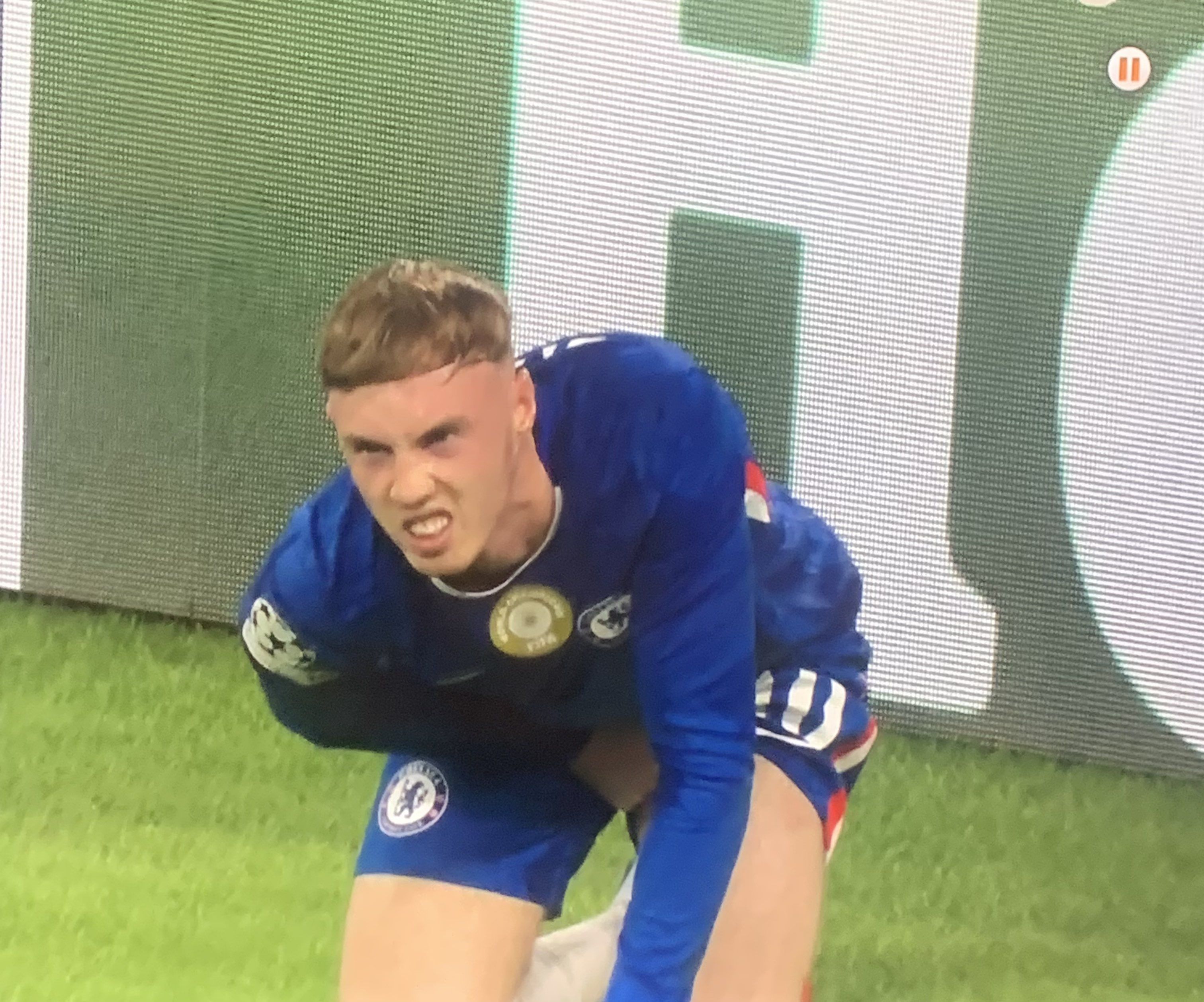 Cole Palmer holds his groin against Bayern Munich.