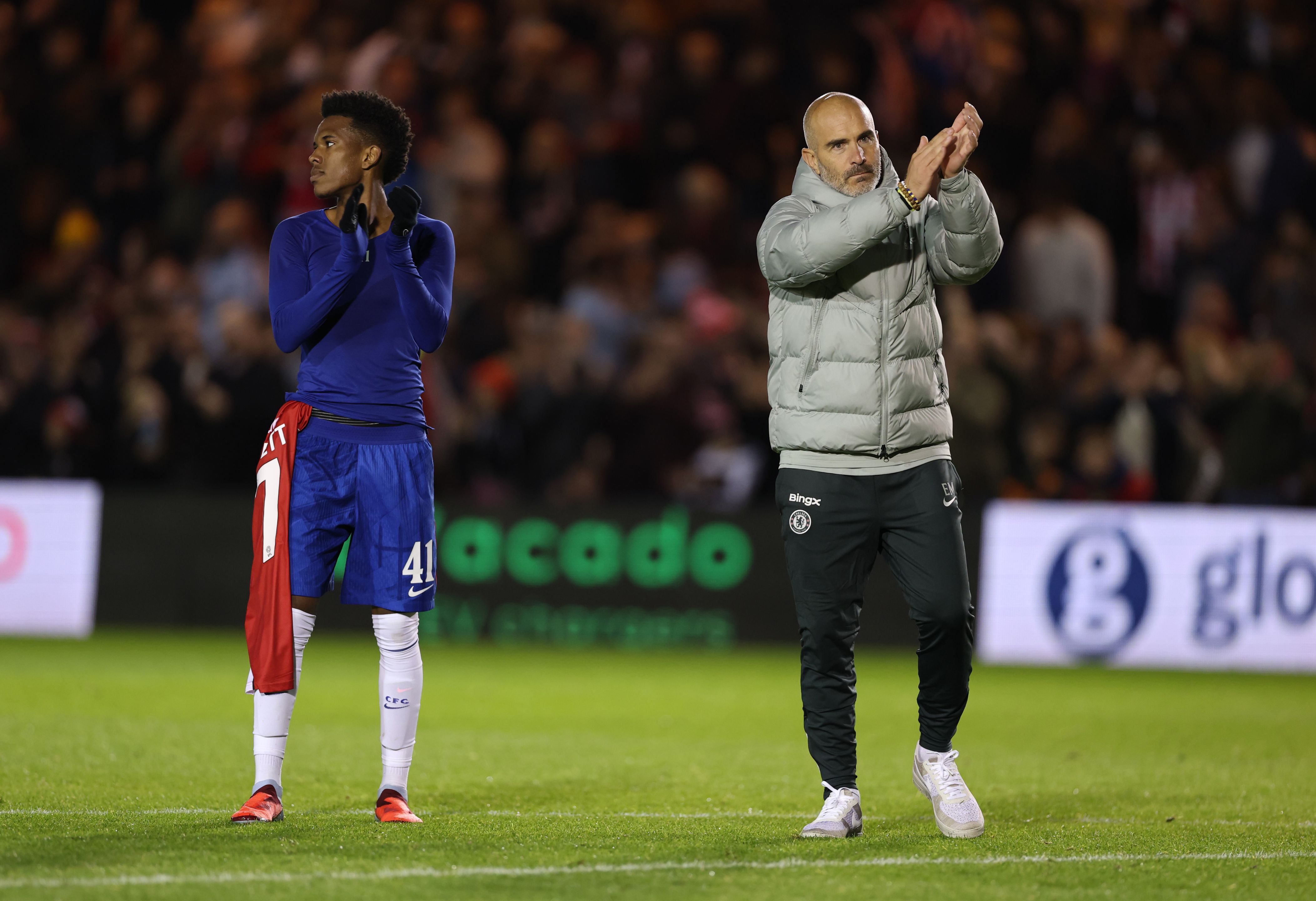 Enzo Maresca applauds the Chelsea fans.