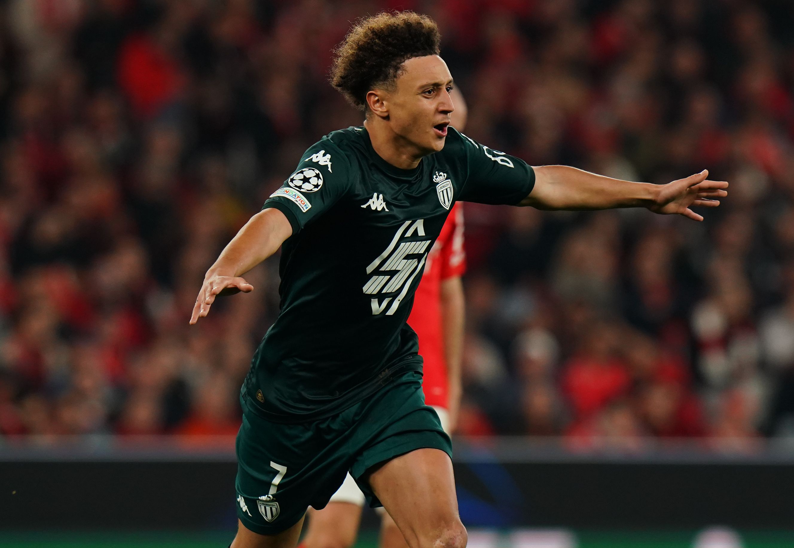 Ben Seghir celebrates scoring for Monaco.