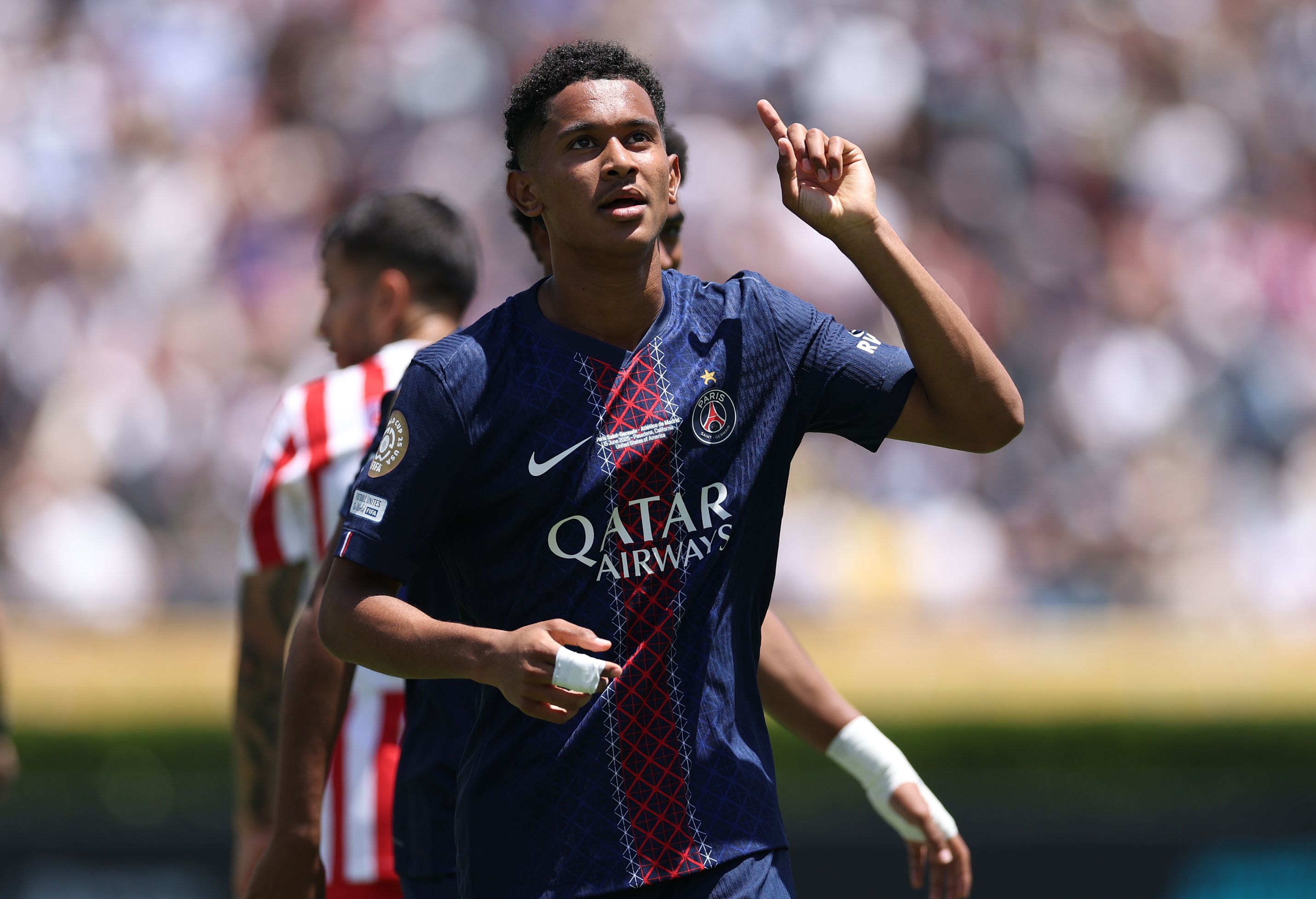 Senny Mayulu celebrates scoring for PSG.