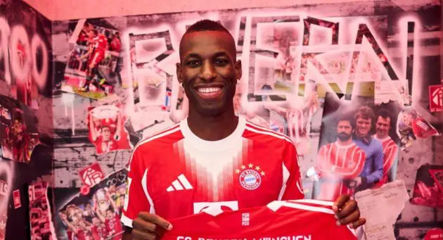 Nicolas Jackson holds up a Bayern shirt ahead of his move.