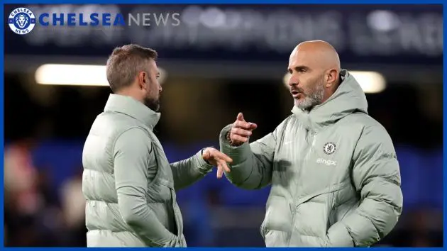 Enzo Maresca speaks with assistant coach Robert Vitiello at Stamford Bridge.