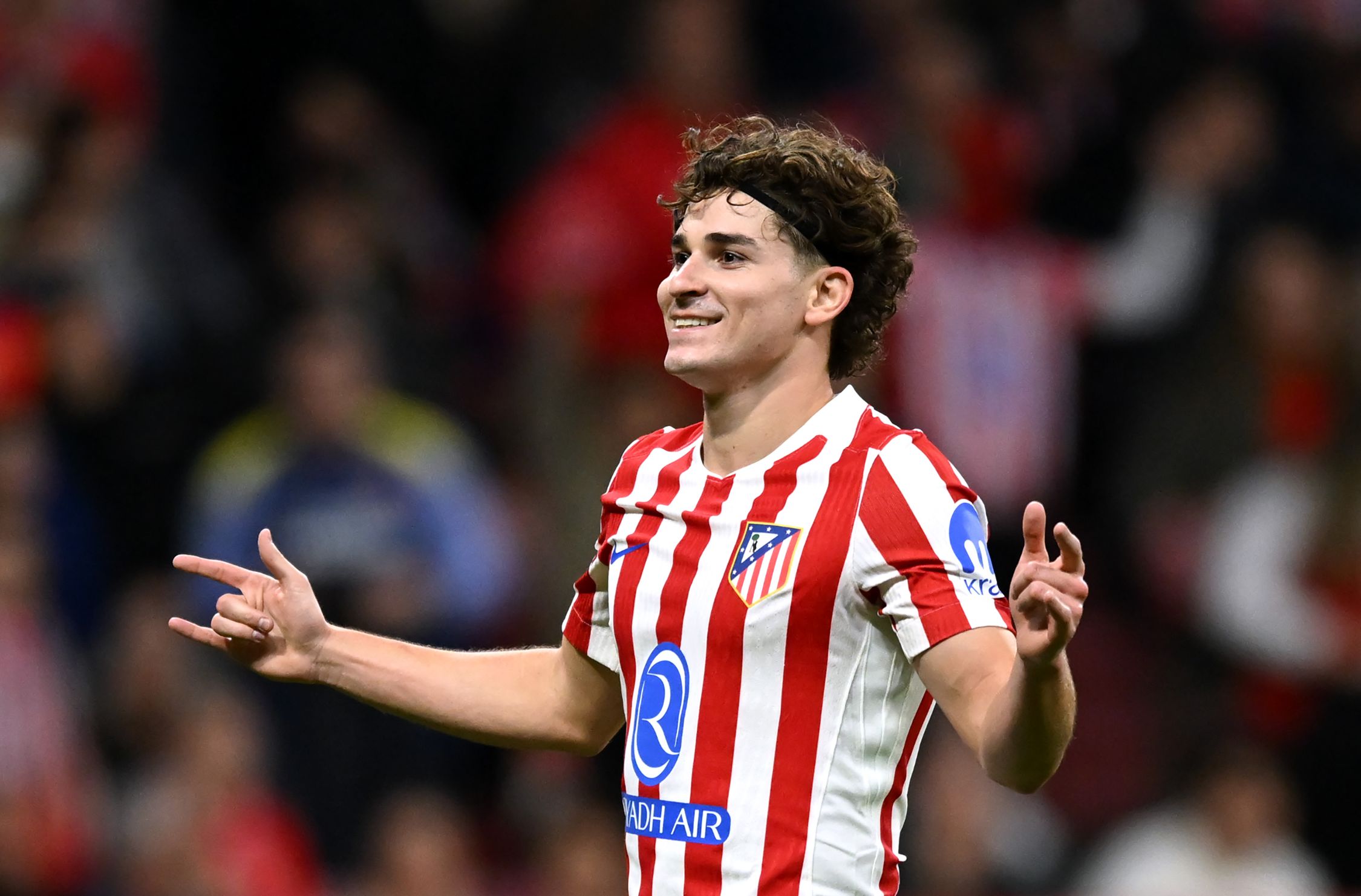 Julian Alvarez celebrates scoring for Atletico Madrid.
