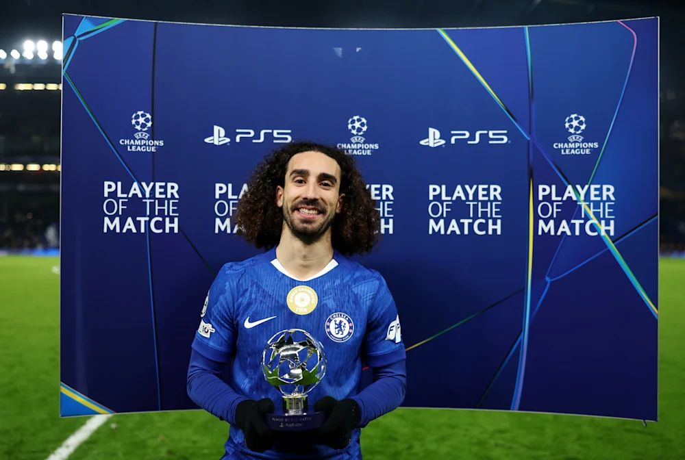 Marc Cucurella celebrates with this UEFA man of the match award.