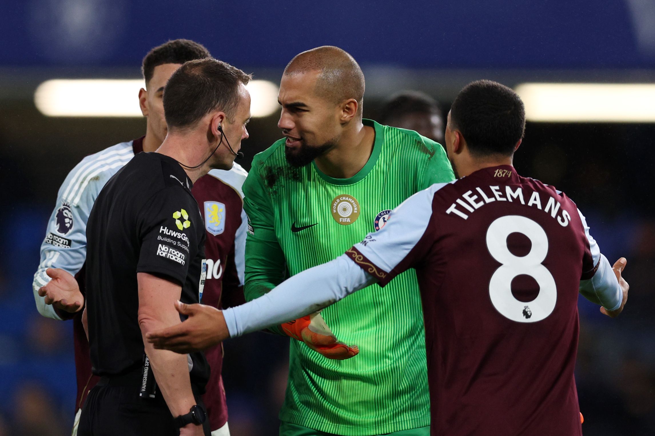 Robert Sanchez speaks to the referee during Aston Villa defeat.