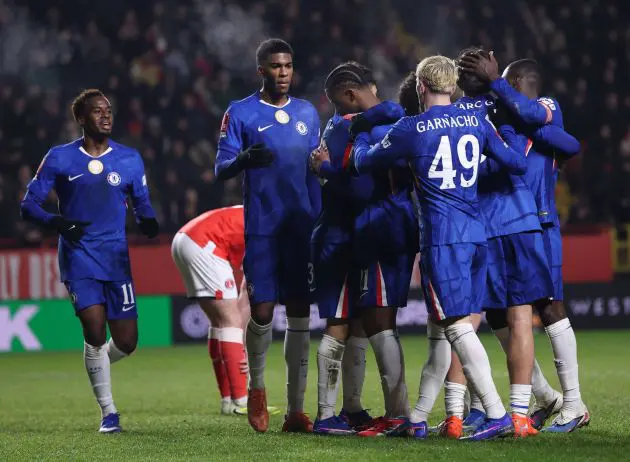 Chelsea players celebrate goal against Charlton.