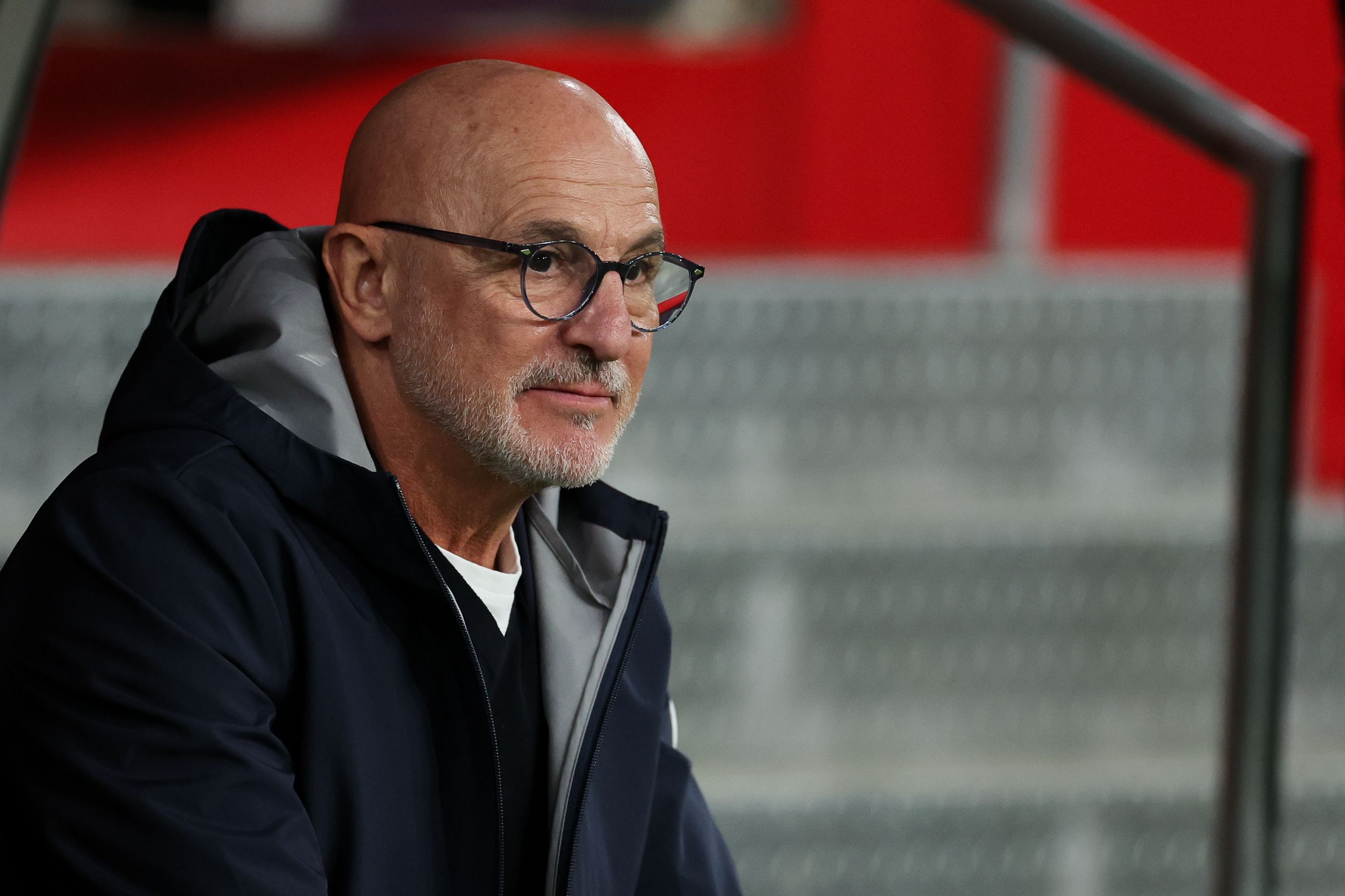 Luis de la Fuente looks on from the touchline.