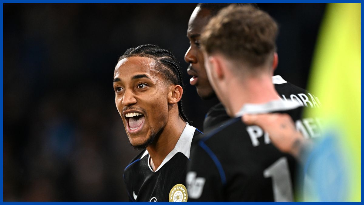 Joao Pedro celebrates with Chelsea players.