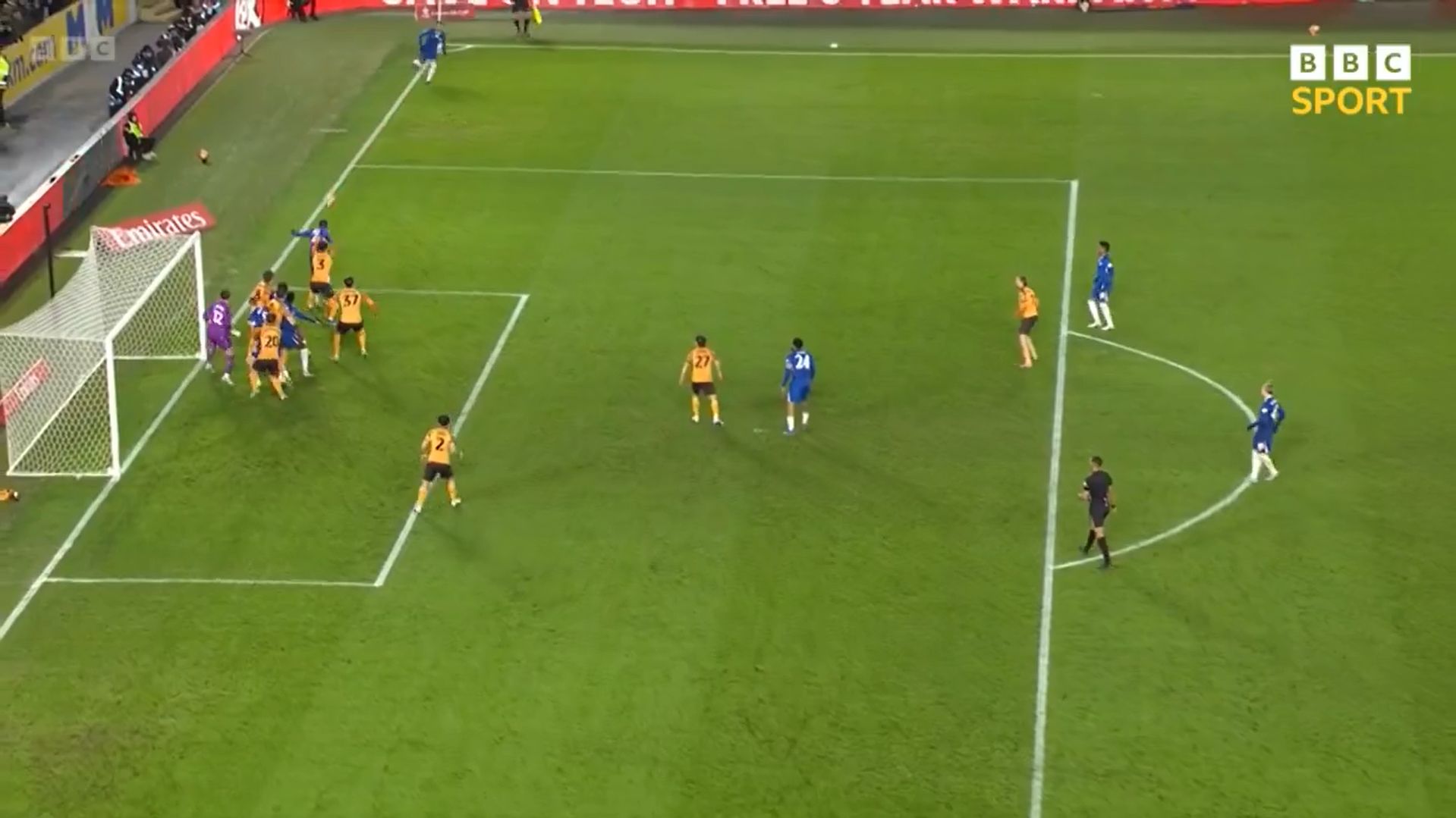 Pedro Neto's corner reaches the near post.