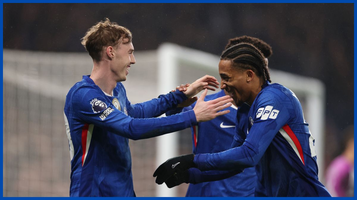 Cole Palmer and Joao Pedro celebrate together.