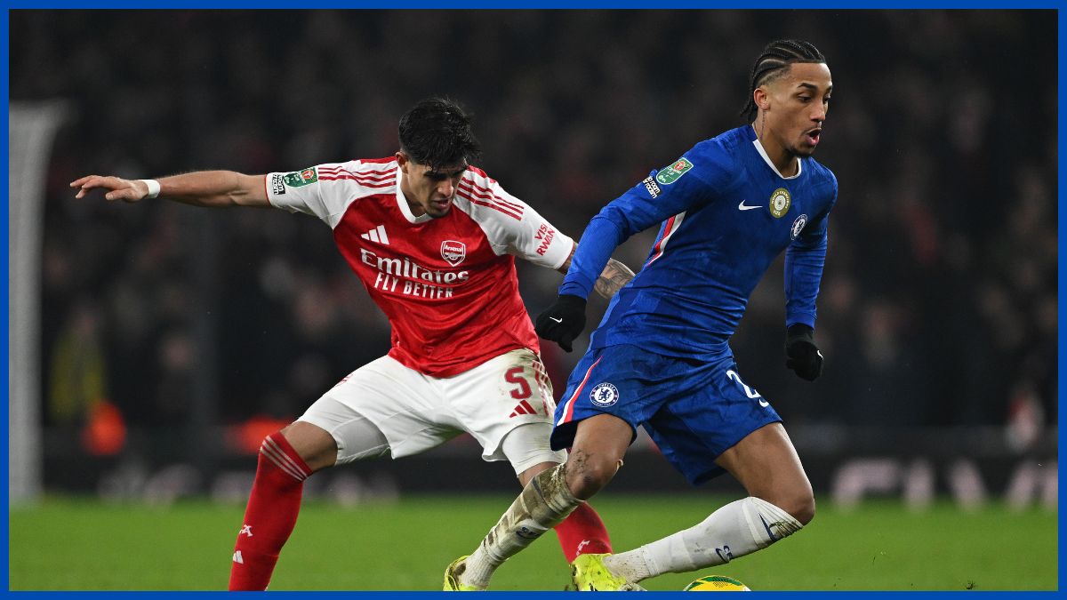 Joao Pedro takes on Arsenal's defence.