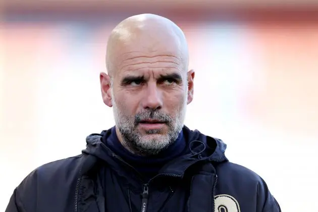 Pep Guardiola arrives at Manchester City game.
