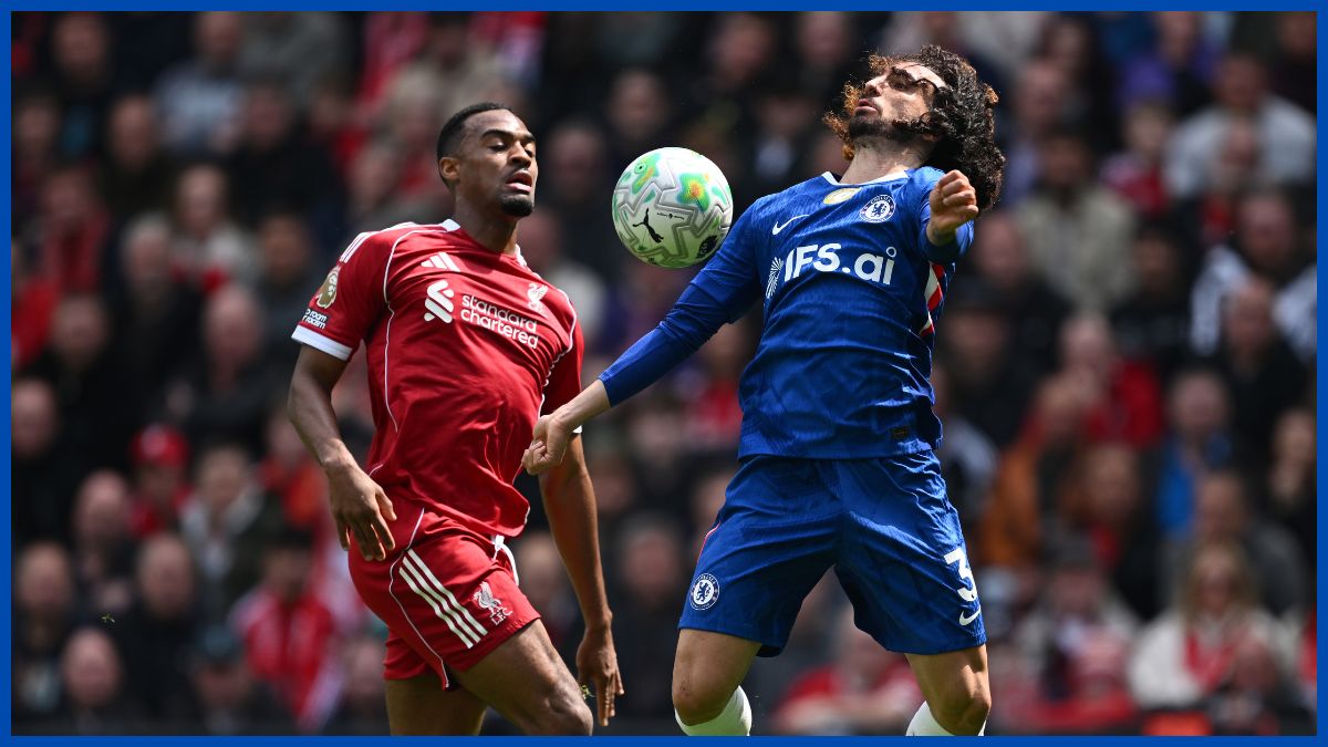 Marc Cucurella wins a ball in the air.