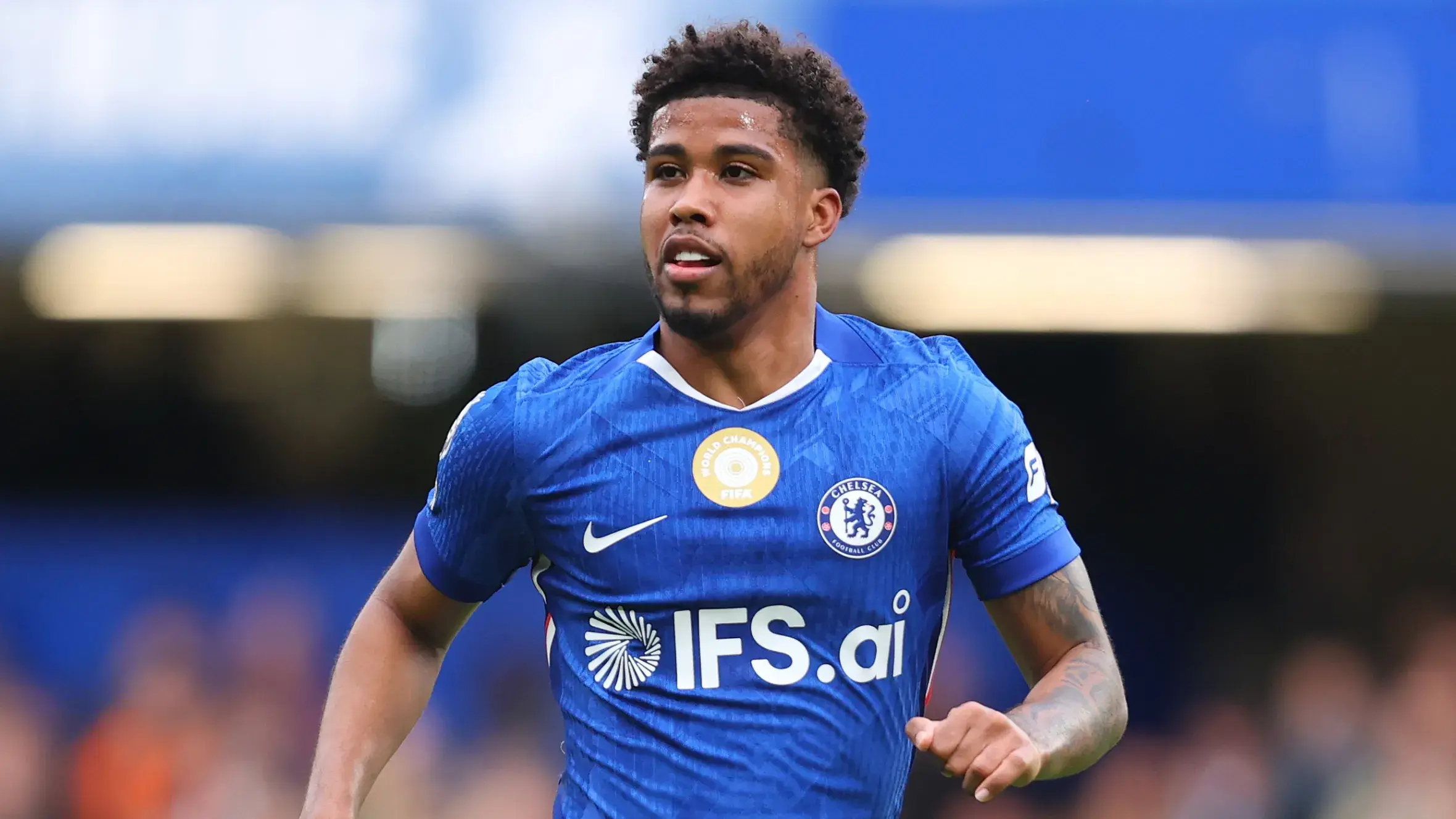 Andrey Santos in blue Chelsea kit during a football match.