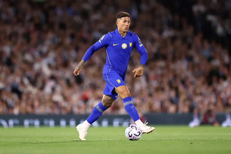 Enzo Fernandez in a blue Chelsea FC kit controlling a football during a match