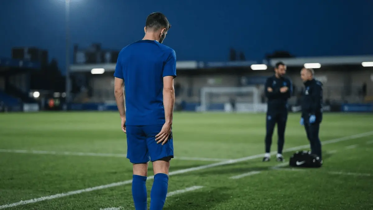 Chelsea player assesses fitness during a final training session before a west London derby
