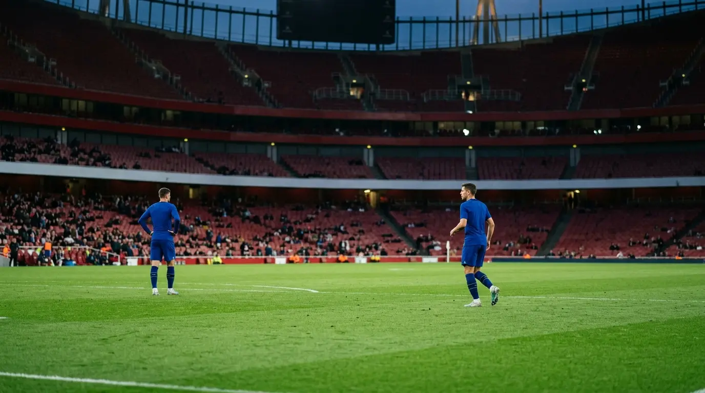 Two Chelsea players cover midfield during a tense stadium match scene